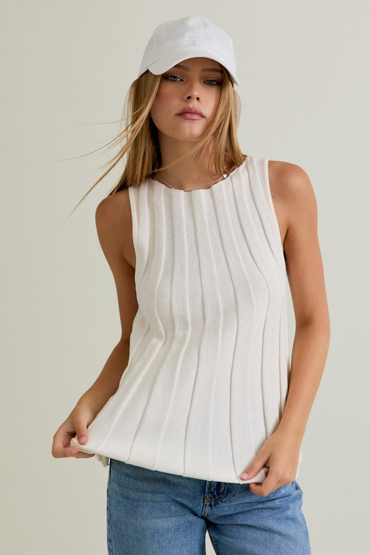  a ribbed sleeveless sweater top that features a boat neckline in an ivory color